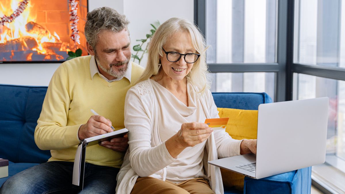 Person using online banking safely on a laptop