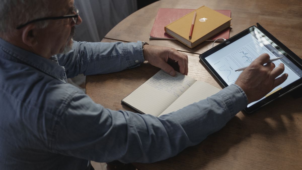 Older person using a tablet after a software update